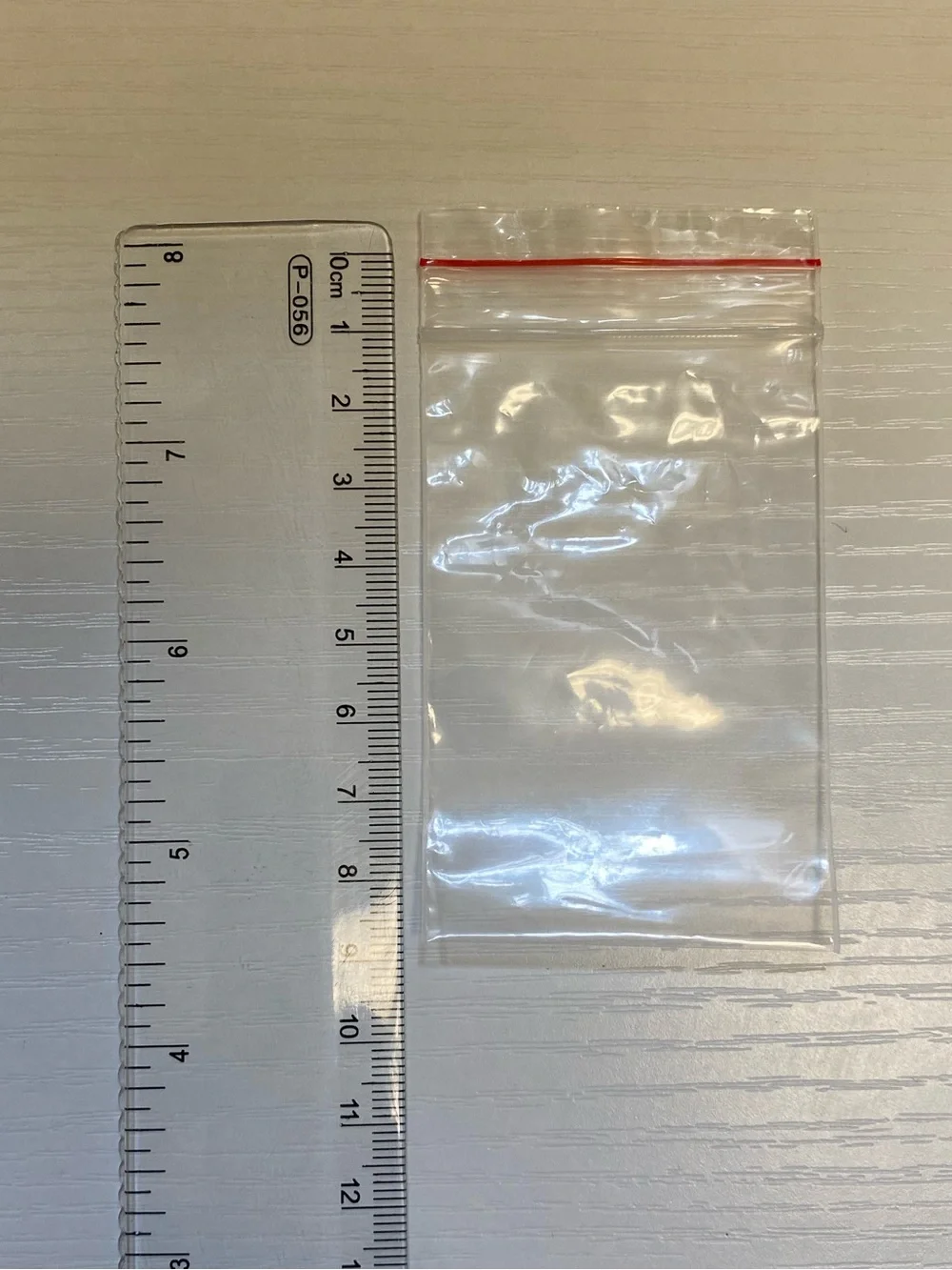 Clear 9x5cm Resealable Plastic Bags with Red Zip - Pack of 50